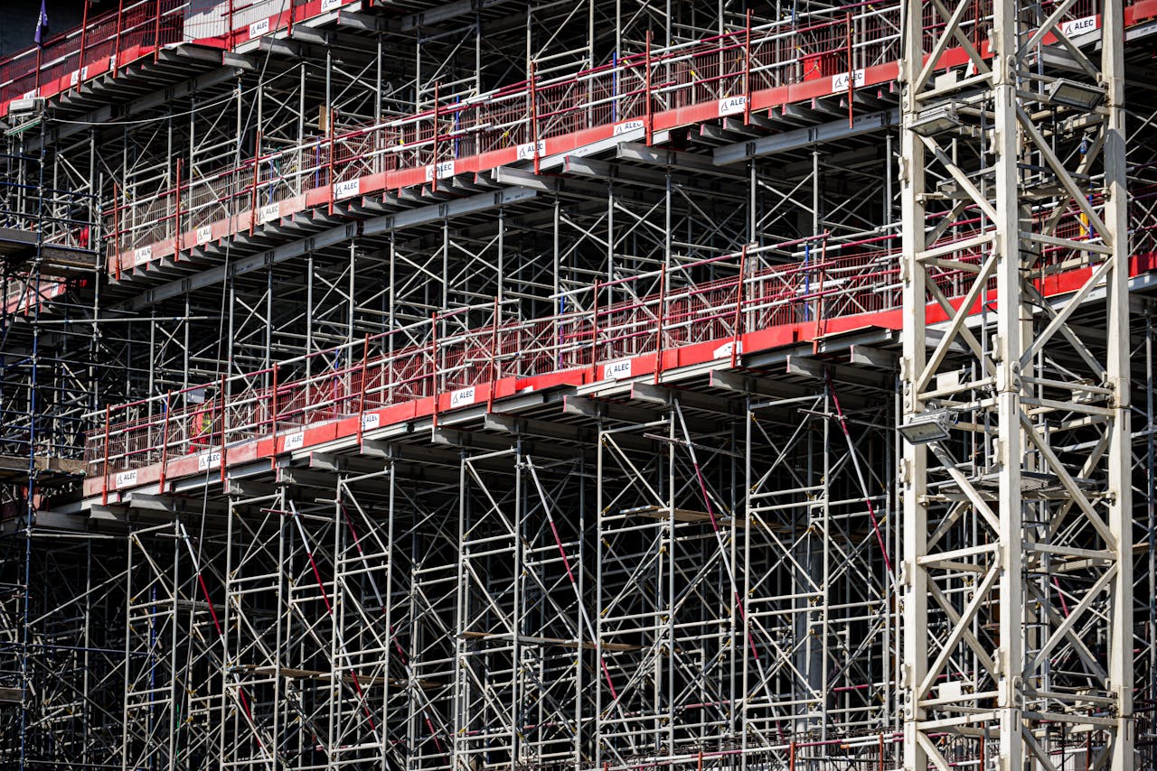 A detailed view of steel scaffolding on a construction site, showcasing architectural design.